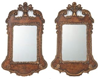 2118
A Pair Of English Carved And Giltwood Wall Mirrors
1741
Inscribed to back: London / 1741 / A.W.
Each with a swan neck pediment centered with an open-work carved cornice with a floral vase motif atop a rectangular frame adorned with C-scrolls, scrolling foliage, and a carved surround enclosing a rectangular beveled glass mirror with rounded corners, 2 pieces
Each: 35.5" H x 21.75" W x 2" D
Estimate: $800 - $1,200