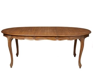 2119
A Louis XV-Style Dining Room Table
First-quarter 20th Century
Carved wood body with one extension leaf over carved flower and scroll cabriole legs
Extended: 29.5" H x 77.25" W x 41.5" D; Closed: 29.5" H x 59.5" W x 41.5" D
Estimate: $400 - $600