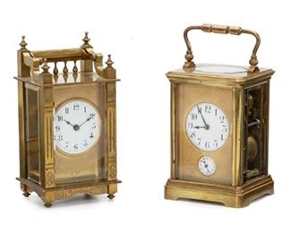 2122
Two French Brass And Glazed Carriage Clocks
First-quarter 20th Century
Comprising one with engraved floral decorations, finials, baluster-style gallery, and swing handle with painted metal dial and black Arabic numeral hour markers and one with alarm and swing handle with painted metal dial and black Arabic numeral hour markers, 2 pieces
Largest: 6.25" H x 3.25" W x 2.625" D; Handle up: 6.5" H
Estimate: $600 - $800