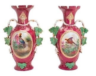 2128
A Pair Of Rouge-Painted Porcelain Vases
Late 19th/early 20th Century
Each marked to base for maker
The mauve body with painted reserves flanked by vine and leaf handles, 2 pieces
Each approximately: 16.75" H x 10.75" W x 6.5" D
Estimate: $300 - $500