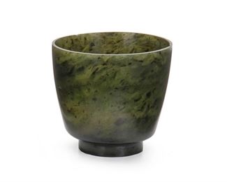 2131
A Chinese Nephrite Jade Cup
20th Century
The dark opaque nephrite cup with gently tapering sides on a raised foot
2.625" H x 2.875" Dia.
Estimate: $400 - $600
