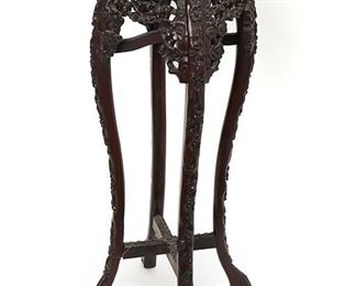 2136
A Chinese Carved Wood Stand
Late 19th/early 20th Century
Carved apron with dogwood blossom design and small inset marble top
36.25" H x 11.5" W x 11.5" D
Estimate: $200 - $400