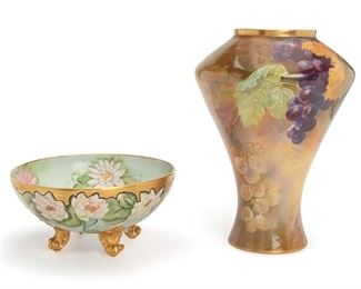 2147
A Polychromed And Painted Bowl With Vase
First-quarter 20th Century
Bowl marked for maker and artist: Limoges / France / CB Maak; Vase marked to base for maker and signed: Limoges Coronet / Laoussettes
Comprising a floral gold-rimmed bowl with four feet and a tall wide-shouldered vase with grape leaf motif, 2 pieces
Bowl: 5.25" H x 10.875" Dia.; Vase: 14.25" H x 10.25" Dia.
Estimate: $200 - $400