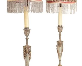 2150
A Pair Of Spelter Candlesticks With Shades
Second-quarter 20th Century
Each candlestick converted to electric with beaded shades, 2 pieces
Each: 20.5" H x 4.5" Dia. (without shade); Each shade: 3.25" H x 7.5" Dia.
Estimate: $300 - $500