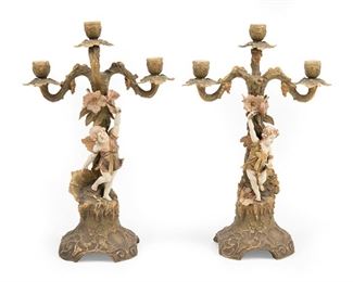 2151
A Pair Of Amphora Candelabra
Circa 1897-1906; Teplitz, Austria
Marked for Ernst Wahliss Turn-Teplitz to base: Depose / Turn Wien
Each figural three-light candelabrum with a fairy holding up flowers and grapes on a scrolled and footed base, 2 pieces
Each approximately: 18" H x 12" W x 7" D
Estimate: $600 - $800
