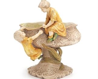 2152
An Imperial Amphora Turn Vase
Late 19th/early 20th Century
Marked for Amphora / Austria
Depicting children climbing a bighorn sheep
11.25" H x 9.75" W x 7.5" D
Estimate: $400 - $600