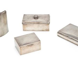 2154
A Group Of Silver Boxes And A Flask
Late 19th/early 20th Century
Most items marked for sterling
Comprising three wood-lined boxes: one hand-hammered box, one English silver box with heraldry to lid and English markings, and one unadorned box; one flask, 4 pieces
Largest: 3.25" H x 6.125" W x 3.5" D
42.570 gross oz. troy approximately
Estimate: $300 - $500