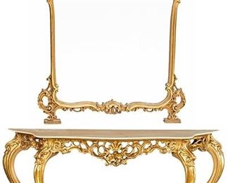 2210
An Italian Rococo-Style Console Table And Mirror
20th Century
The carved giltwood console with a thin marble top over acanthus leaf and scroll motif together with an associated mirror, 2 pieces
Table: 33.25" H x 58" W x 16.5" D; Mirror: 61.5" H x 46" W x 4" D
Estimate: $1,000 - $1,500