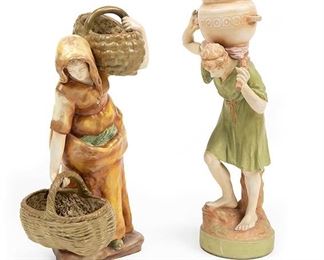 2220
A Pair Of Amphora Figural Vessels
Circa 1905-1910; Teplitz, Austria
Each marked for Amphora Riessner & Kessel Turn-Teplitz: [Crown] / Austria / Amphora; Further marked: 5097 / 8G and 4026 / 26
Comprising a female figure with two baskets and a male figure holding a vessel on his shoulders, 2 pieces
Each approximately: 17.5" H x 8" W x 7.25" D
Estimate: $400 - $600