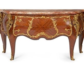 2225
A Louis XV-Style Commode
20th Century
The marble top over two long drawers with parquetry veneer and gilt-bronze mounts flanked by figural masks raised on splayed legs with sabots
38" H x 76" W x 26.5" D
Estimate: $2,000 - $3,000