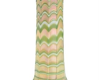2246
A Loetz-Style Iridescent Glass Vase
Late 19th/early 20th Century
The green and gold iridescent vase with wide rim
8.75" H x 3.5" Dia.
Estimate: $300 - $500