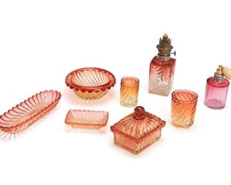 2247
An Assembled Group Of Baccarat Glass Items
20th Century
Seven signed for Baccarat Depose
Comprising a perfume bottle with atomizer, two trays, two tumblers, a covered soap dish, a lamp, and a bowl, most in "Ambrina" swirl, 8 pieces
Largest: 8" H x 3" W x 3" D
Estimate: $400 - $600