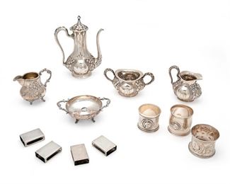 2251
A Group Of .925 And .800 Silver Objects
Late 19th/early 20th Century
Most items marked; Various makers
Comprising four Lebkuecher & Co. match box covers, three napkin rings with repousse and chased floral motifs and portrait heads, a three-piece Art Nouveau-style miniature tea set, and a two-piece German creamer and sugar bowl, 12 pieces
Largest: 7" H x 5" W x 3" D; Smallest: .5" H x 1.75" W x 1.125" D
22.705 oz. troy approximately
Estimate: $500 - $700