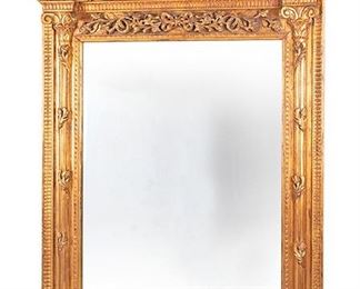 2264
A Large Giltwood Wall Mirror
First-half 20th Century
The carved cornice with a lion's head mask atop a carved rectangular architectural frame with columnar motifs adorned with scrolling foliage enclosing a rectangular beveled glass mirror
105" H x 68" W x 5.5" D
Estimate: $2,000 - $3,000