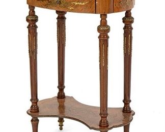 2266
A French Louis XVI-Style Lamp Table
Second-quarter 20th Century
The lamp table with parquetry veneer and floral brass inlay to top and apron raised on brass-mounted fluted tapering legs with a parquetry-veneered and floral brass inlaid stretcher
27.5" H x 18.5" W x 13.875" D
Estimate: $300 - $500