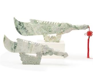 2273
Two Hardstone Chinese Ceremonial Knives
Second-half 20th Century
Each blade with carved dragon and animal motif to the sides and handle set on a matching stand, 2 pieces
Larger: 12.5" H x 30" W x1.5" D; Smaller: 9.5" H x 23" W x 1.5" D
Estimate: $300 - $400