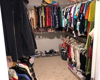 Very large walk in closet filled with NICE clothes