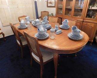 Ricardo Lynn dining table and chairs. Matching china cabinet as well.