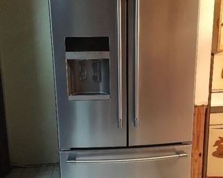 Maytag refrigerator with french doors and bottom freezer. Measures 36 in across x 31 in deep and needs 69 1/2 in clearance for height. 