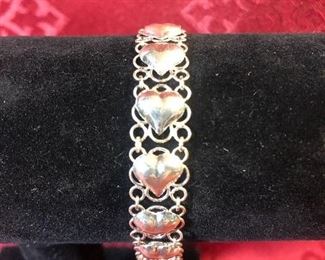 Sterling Silver Heart Bracelet. Weighs 7.5 grams. 