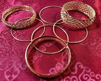 Assortment of costume bangle bracelets. 