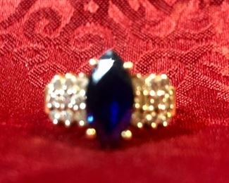 14 K woman’s sapphire and Diamond Ring. Size 7 1/2 and weighs 4.1 grams.
