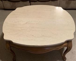 Marble Top and Wood Coffee Table. Top is removable. Measures 31 1/2 sq. And 15 inches tall.