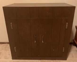 Wood cabinet with two inside shelves measures 32
x 161/2 and 30 inches tall. 