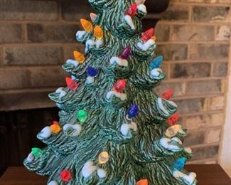 Ceramic Christmas tree, it works and measures 13 inches tall.
