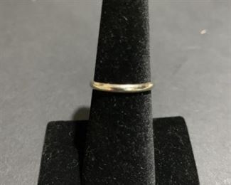 14K white gold band. Size 6 and weighs 1.7 g.