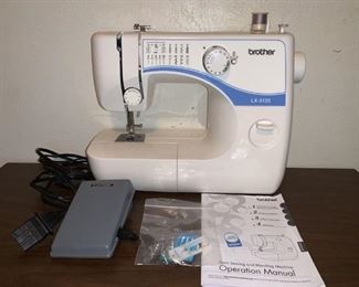 Brother LC-3125 Electric Sewing Machine. Tested and works great. Comes in carrier and with items shown in pictures.