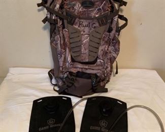 Game Winner Hunting Backpack With 2 Never Used Water Pouches. Backpack is in great condition, but has a name written in marker on the front.