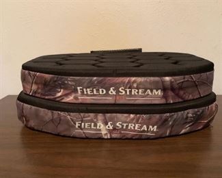 2 Field & Stream Seat Cushions. Writing in marker on the back. 
