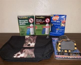 Lot includes: 3 Mosquito Repellents, 1 Headlamp Still In Package, and 1 Ameristep pouch.