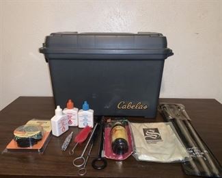Pistol shotgun/rifle cleaning and polishing products. Comes in Cabela’s carrier. 