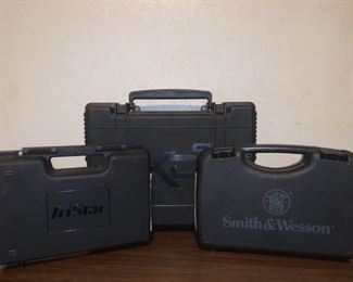 3 Empty Gun Cases: Tristar 9mm caliber, Smith & Wesson .22lr caliber, and XDS 9mm pistol.