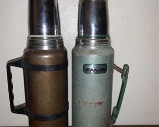 2 Vintage Stanley Thermos’. Both lids are broken,
but are still usable. 