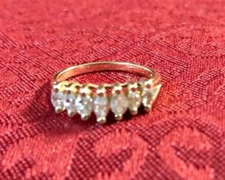 14 K gold marquis Diamond ring, size 5 1/2 and weighs
2.2 grams.