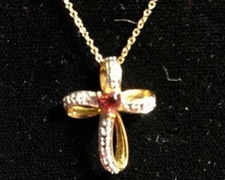 925 Sterling with Gold Wash Cross, Garnet Stone, and
Chain. 