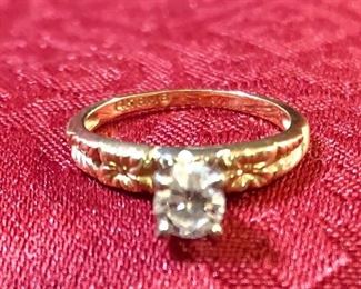 14 K Woman’s Diamond Ring, size 5 to 5 1/2.