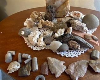 Beautiful Variety of Rocks and Arrowheads. Includes  small broken geode and one unbroken. Doilie is included.