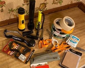 Lot of Flashlights, Tape, Stapler and Staples, Muzzle for Dog, Pocket Knife, and Stencils.