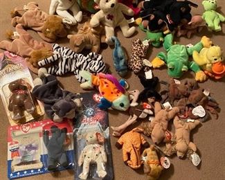 Lot of More Than 30 Beanie Babies. Some are new in package.