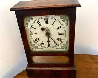 $60  Detail Vintage  wood and Roman numeral clock.  8" W, 12" H, 4" D. 