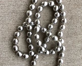$28 Long strand faux blue pearls 34"L