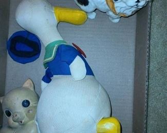 ANTIQUE TOYS...1 is a Squeeke and one DONALD DUCK"