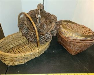 WICKER BASKETS. 1 is made from Pine Cones