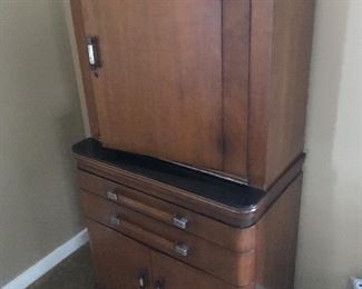 Mid Century Illumination Medical cabinet also available is the matching Low Glass Mahogany cabinet and matching physicians chair.  Wonderful condition.