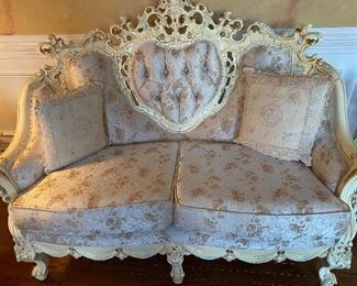 Loveseat and one of the 9 pieces Celiné hand made set. In meticulous condition. 