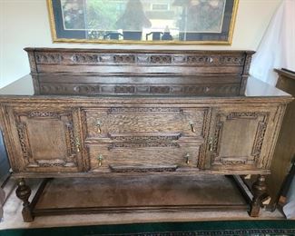 Antique buffet w/glass top - picture does not do this piece justice - actually darker wood and intricate design accents